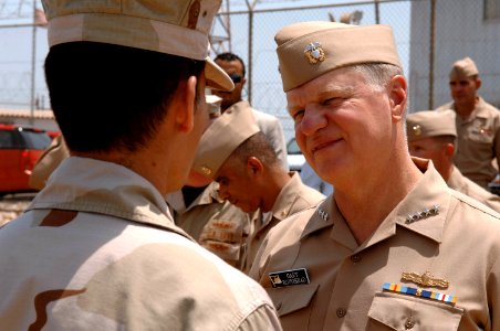 US Navy 080812-N-8273J-219 Chief of Naval Operations (CNO) Adm. Gary Roughead speaks to Sailors while receiving a tour of Bahrain Port Facility photo