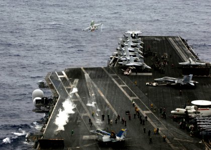 US Navy 080806-N-7883G-154 An F-A-18C Hornet assigned to Strike Fighter Squadron (VFA) 195 launches from the aircraft carrier USS Kitty Hawk (CV 63) for the last time