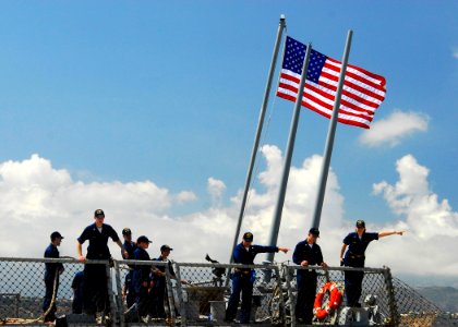 US Navy 080811-N-0780F-003 Crew members conduct mooring operations as the guided-missile destroyer USS McFaul (DDG 74) arrives for a routine port visit to Souda Bay