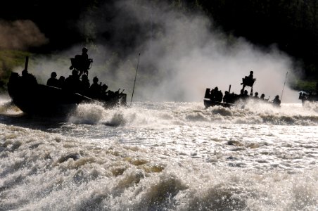 US Navy 080811-N-4205W-016 Special Warfare Combatant-craft Crewmen assigned to Special Boat Team 22 (SBT-22) conduct a hot extract photo