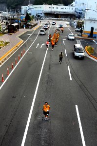 US Navy 080813-N-8546L-209 A division of Sailors assigned to the amphibious command ship USS Blue Ridge (LCC 19) and U.S. 7th Fleet staff chief selectees run throughout Yokosuka Naval Base with the Blue Ridge chief's mess