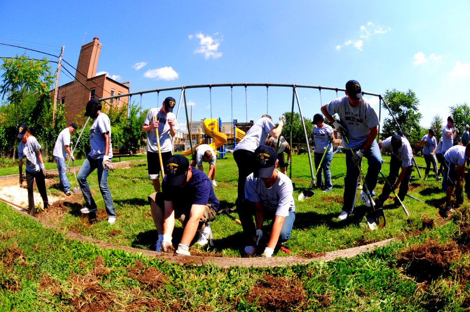 US Navy 080808-N-1831S-030 Sailors assigned to the Pre-commissioning unit (PCU) guided-missile destroyer PCU Sterett (DDG 104), dig up the ground at Indiana Road Park
