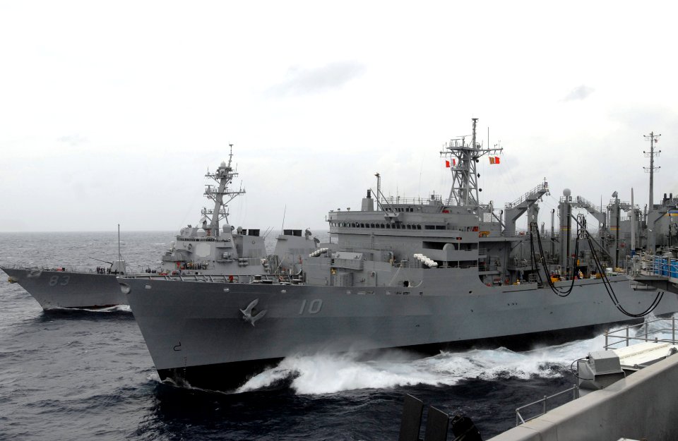 US Navy 080808-N-4995K-003 Fuel lines connect the Military Sealift Command fast combat support ship USNS Bridge (T-AOE 10) to the guided-missile destroyer USS Howard (DDG 83) and the Nimitz-class aircraft carrier USS Ronald Rea