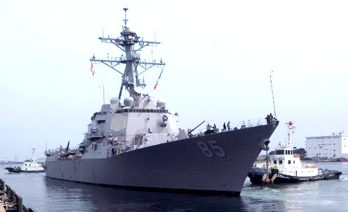 US Navy 080812-N-0483B-017 A Japanese harbor tug assists the Arleigh Burke-class guided-missile destroyer USS McCampbell (DDG 85) as the ship departs Commander, Fleet Activities Yokosuka