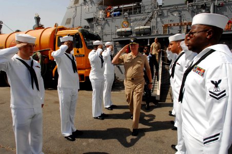US Navy 080812-N-8273J-085 hief of Naval Operations (CNO) Adm. Gary Roughead is piped ashore after visiting Sailors aboard the Avenger-class mine warfare ship USS Dextrous (MCM 13)
