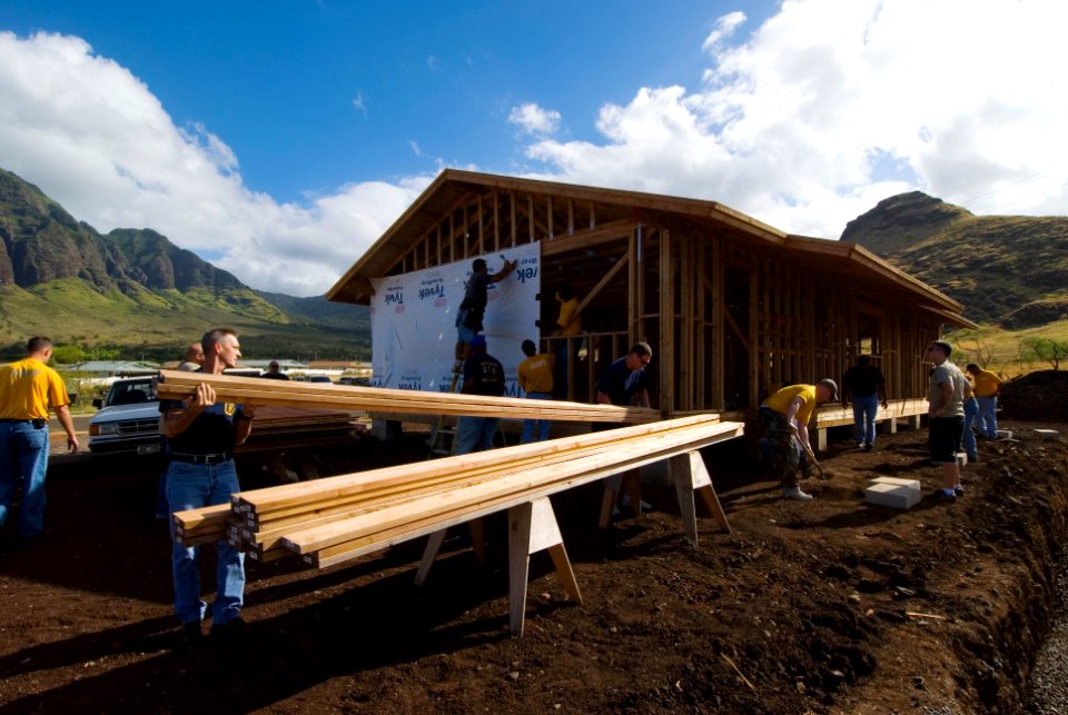 US Navy 080809-N-6674H-003 Navy Region Hawaii chief petty officer selectees and their sponsors work on a new house for a Habitat for Humanity community service project