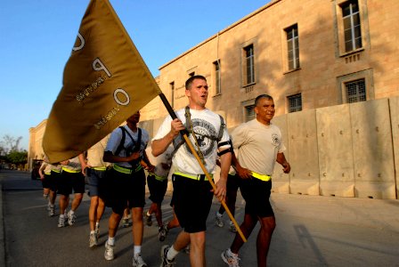 US Navy 080814-N-8273J-004 Master Chief Petty Officer of the Navy (MCPON) Joe R. Campa Jr. participates in morning hysical training with the chiefs and chief selectees of the International Zone in Baghdad photo