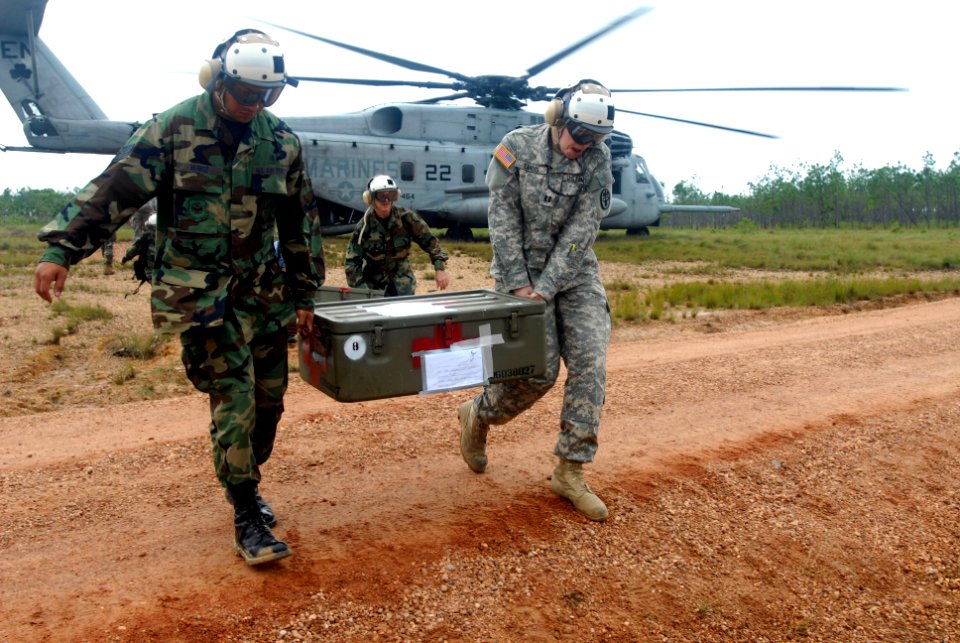 US Navy 080813-N-3595W-040 Joint military personnel embarked aboard the amphibious assault ship USS Kearsarge (LHD 3) transport supplies to a temporary medical clinic in Tuapi, Nicaragua