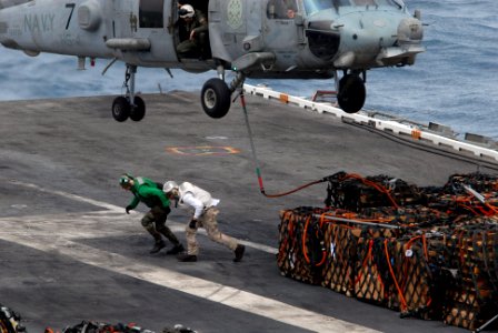 US Navy 080815-N-4995K-089 An HH-60H Sea Hawk conducts a vertical replenishment with the aircraft carrier USS Ronald Reagan (CVN 76)