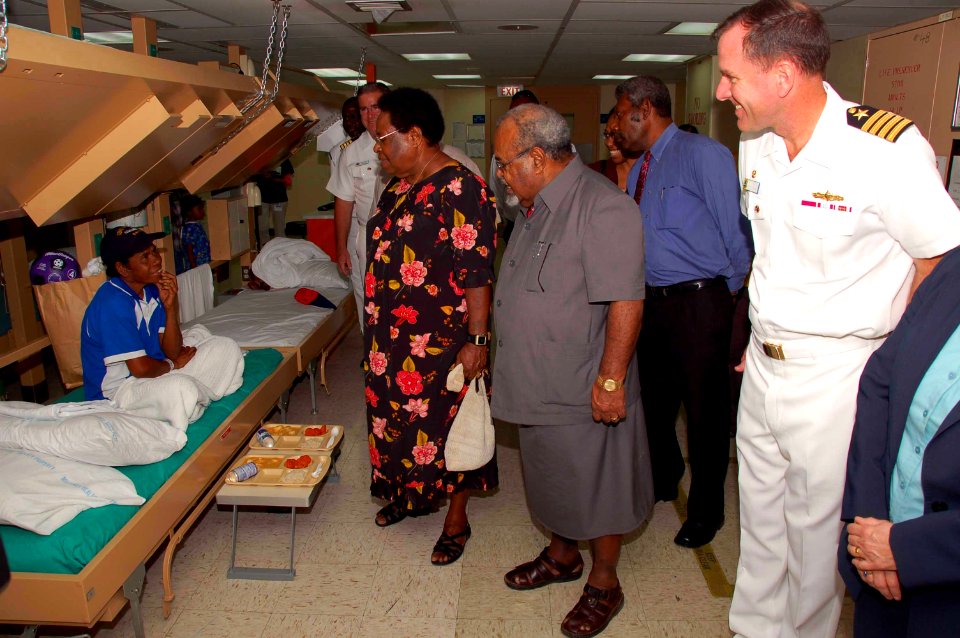 US Navy 080815-N-7498L-011 Papua New Guinea Prime Minister the Right Honorable Sir Michael Somare speaks with a patient