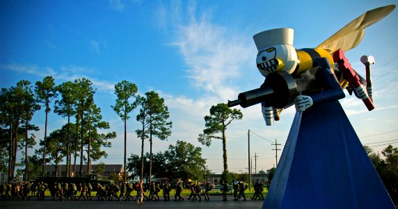 US Navy 080815-N-7367K-013 Seabees assigned to Naval Mobile Construction Battalion (NMCB) 1 return to their starting point after completing a three-mile force march at Naval Construction Battalion Center, Gulfport