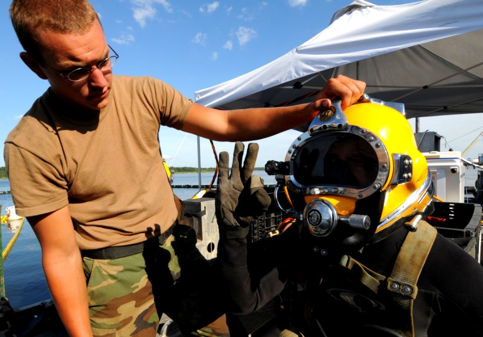 US Navy 080813-N-8933S-140 Navy Diver 2nd Class Todd Walsh gives the okay to Navy Diver 3rd Class Levi Hughes