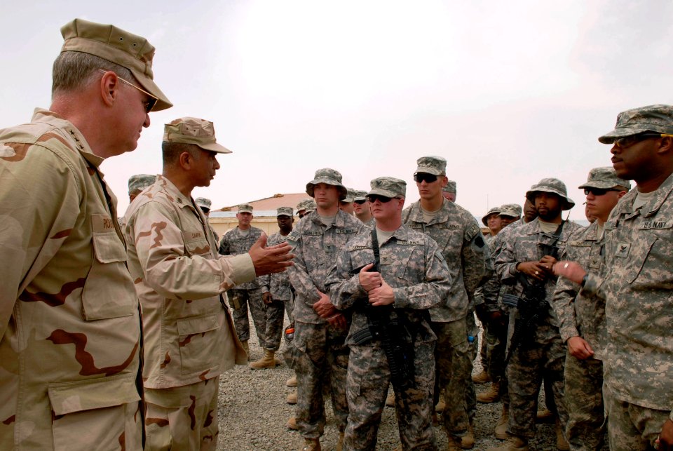 US Navy 080815-N-8273J-253 Chief of Naval Operations (CNO) Adm. Gary Roughead, left, and Master Chief Petty Officer of the Navy (MCPON) Joe R. Campa Jr. speak with Sailors, Marines and Soldiers
