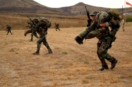 US Navy 080814-N-5366K-050 SEAL qualification training (SQT) students from Class 268 perform buddy carries