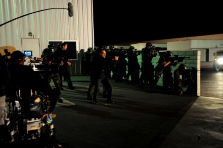 US Navy 080812-N-2959L-147 Thirteen West Coast-based Navy SEALs act in a scene for an upcoming episode of the Fox network television series