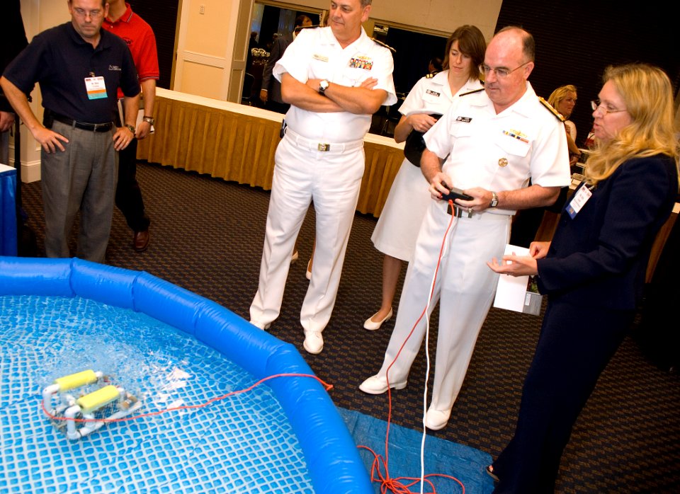 US Navy 080812-N-7676W-104 Vice Adm. John C. Harvey Jr., director, Navy Staff, operates Sea Perch during his visit to the exhibit hall at the Office of Naval Research 2008 Science and Technology Partnership Conference