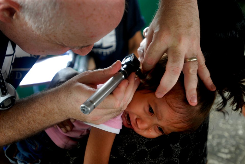 US Navy 080813-N-3595W-123 Project Hope volunteer Dana Braner gives basic medical care to a Nicaragua child during a Continuing Promise 2008 humanitarian assistance project