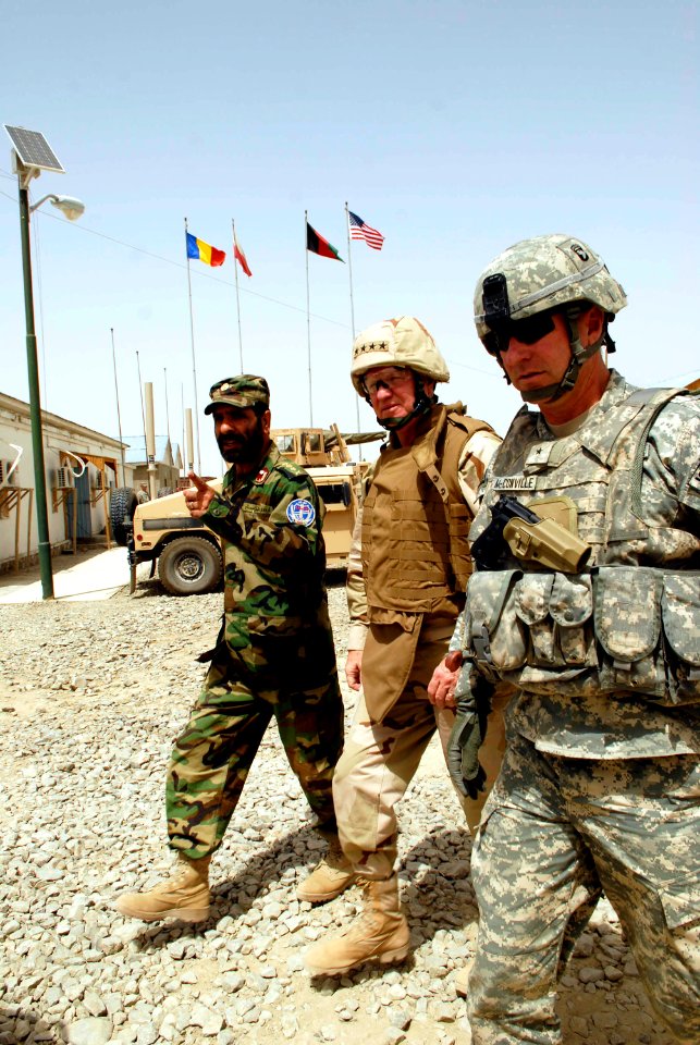 US Navy 080815-N-8273J-301 Chief of Naval Operations (CNO) Adm. Gary Roughead, middle, tours a Provincial Reconstruction Team (PRT) site with other U.S. and Afghanistan leadership