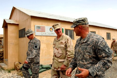 US Navy 080815-N-8273J-450 Chief of Naval Operations (CNO) Adm. Gary Roughead, middle, tours Provincial Reconstruction Team (PRT) Ghazni while visiting with Sailors, Marines and Soldiers