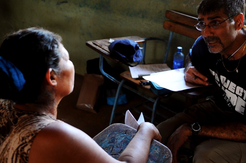 US Navy 080814-N-4515N-087 Dr. Rai Daljeet, Stanford University Associate Clinical Professor and a Project Hope volunteer, diagnoses and prescribes treatment for a Nicaraguan woman during a humanitarian assistance project