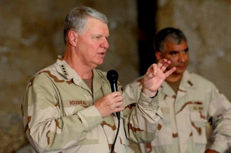 US Navy 080816-N-8273J-209 Chief of Naval Operations (CNO) Adm. Gary Roughead speaks with Sailors during an all-hands call at Bagram Air Force Base photo