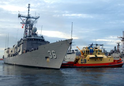 US Navy 080819-N-3285B-099 Tugboats assist the guided-missile frigate USS Underwood (FFG 36) as the ship departs Naval Station Mayport