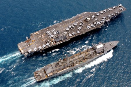 US Navy 080815-N-5961C-002 The aircraft carrier USS Ronald Reagan (CVN 76) and the Military Sealift Command fast combat support ship USNS Bridge (T-AOE 10) maneuver together during a replenishment at sea