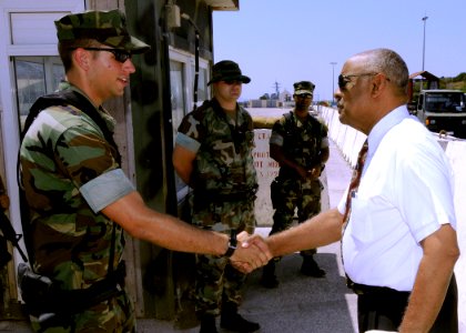 US Navy 080819-N-0780F-003 Assistant Secretary of the Navy for Installations and Environment, The Honorable BJ Penn, shakes hands with Master-at-Arms 3rd Class Christopher Wilkins