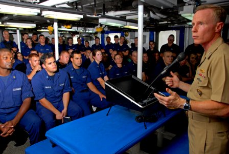 US Navy 080820-G-1103J-509 Rear Adm. Joe Leidig addresses the crew of the U.S. Coast Guard Cutter Dallas (WHEC 716)