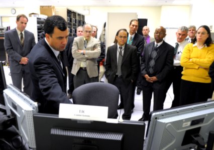 US Navy 111214-N-PO203-126 Phil Irey explains to Department of the Navy officials the Office of Naval Research's suite of information technology to