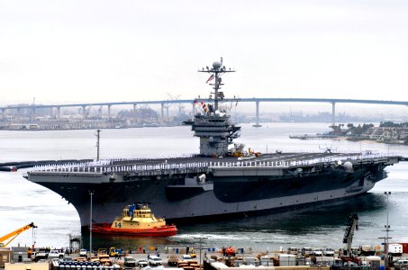 US Navy 080821-N-4163T-001 The crew of the aircraft carrier USS George Washington (CVN 73) mans the rails as the ship departs Naval Air Station North Island