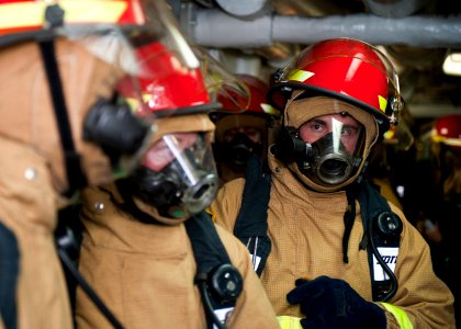 US Navy 120123-N-FI736-068 Sailors prepare for a general quarters training exercise aboard the aircraft carrier USS Enterprise (CVN 65)
