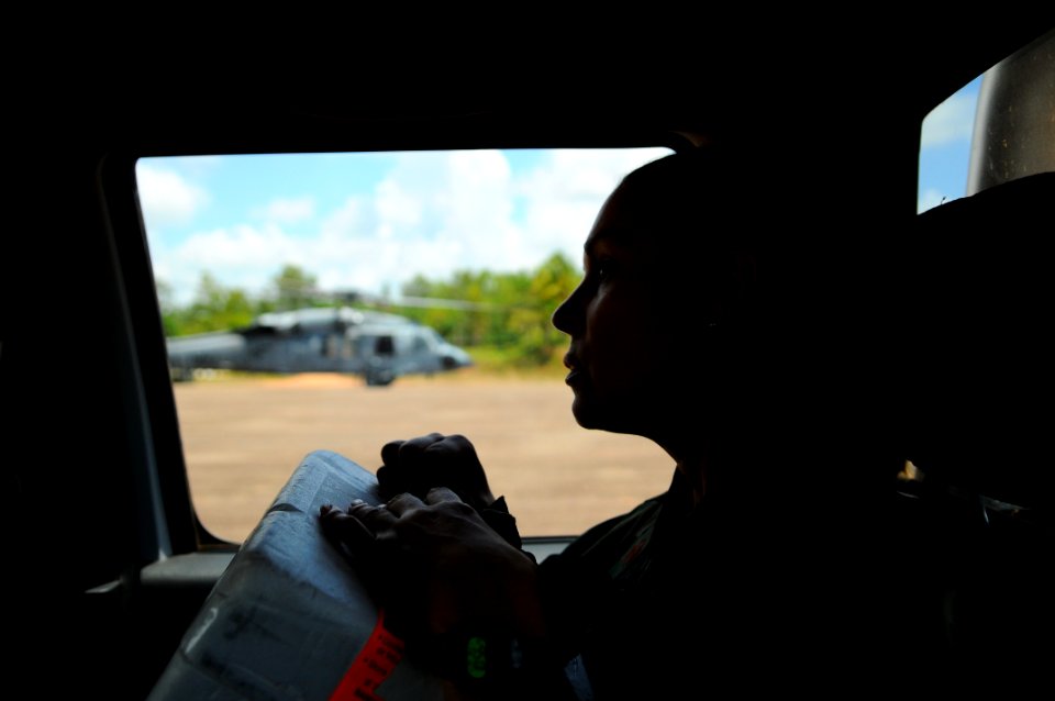 US Navy 080821-N-4515N-098 Lt. Cmdr. Maria Norbeck rushes blood to a woman in need