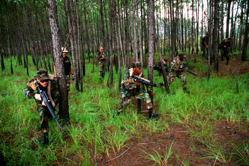 US Navy 080818-N-7367K-002 Seabees assigned to Naval Mobile Construction Battalion (NMCB) 1 engage a simulated enemy force as part of the Squad Leaders course at Camp Shelby