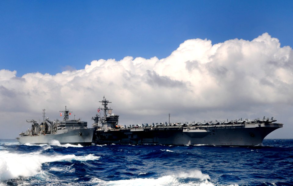 US Navy 120102-N-BC134-007 The Nimitz-class aircraft carrier USS Carl Vinson (CVN 70) and the Military Sealift Command fast combat support ship USN
