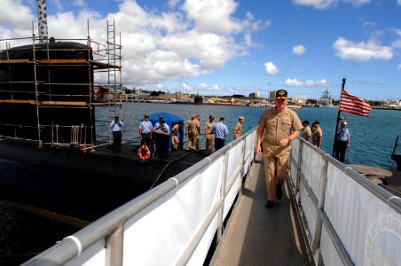 US Navy 080818-N-8273J-239 Chief of Naval Operations (CNO) Adm. Gary Roughead is piped ashore after visiting with Sailors aboard the Los Angeles-class fast-attack submarine USS Columbia (SSN 771)