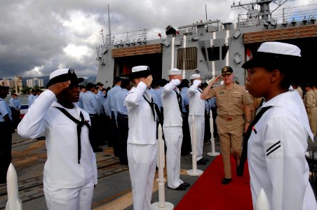 US Navy 080818-N-8273J-331 Chief of Naval Operations (CNO) Adm. Gary Roughead is piped ashore after visiting with Sailors aboard the Arleigh Burke-class destroyer USS Chafee (DDG 90)