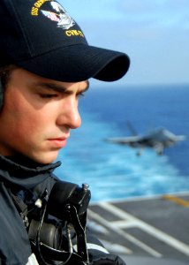 US Navy 080825-N-1644H-247 Seaman Michael Pero stands aft lookout aboard the aircraft carrier USS George Washington (CVN 73) during flight quarters