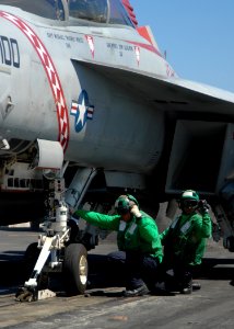 US Navy 080823-N-1038M-082 Aviation Boatswain's Mates (Equipment) give a