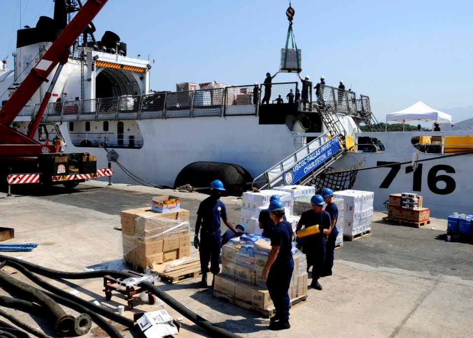 US Navy 080821-N-0780F-005 U.S. Coast Guard personnel load supplies aboard the U.S. Coast Guard Cutter Dallas (WHEC 716)