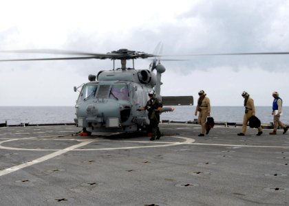 US Navy 080901-N-3392P-003 An SH-60B Sea Hawk conducts a passenger transfer