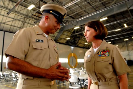 US Navy 080825-N-9818V-053 Master Chief Petty Officer of the Navy (MCPON) Joe R. Campa Jr. speaks with Aviation Warfare Systems Operator 1st Class Kathleen Reilly, Commander, Navy Reserve Sailor of the Year, before the 2008 Nav
