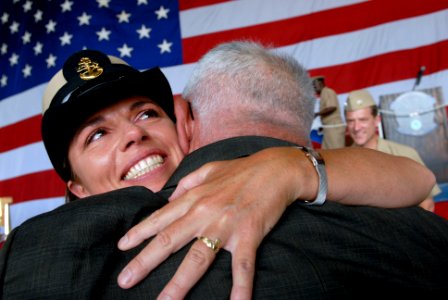 US Navy 080825-N-9818V-272 Chief Aviation Warfare Systems Operator Kathleen Reilly hugs her father
