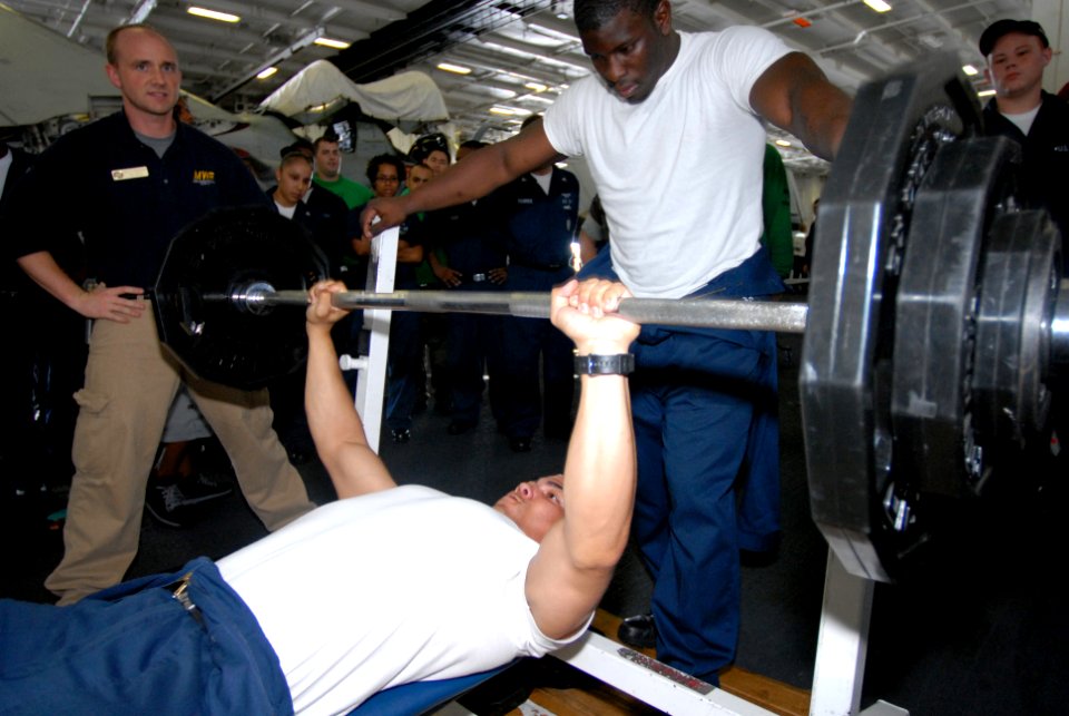 US Navy 080822-N-4995K-084 Sailors participates in a bench press competition celebrating