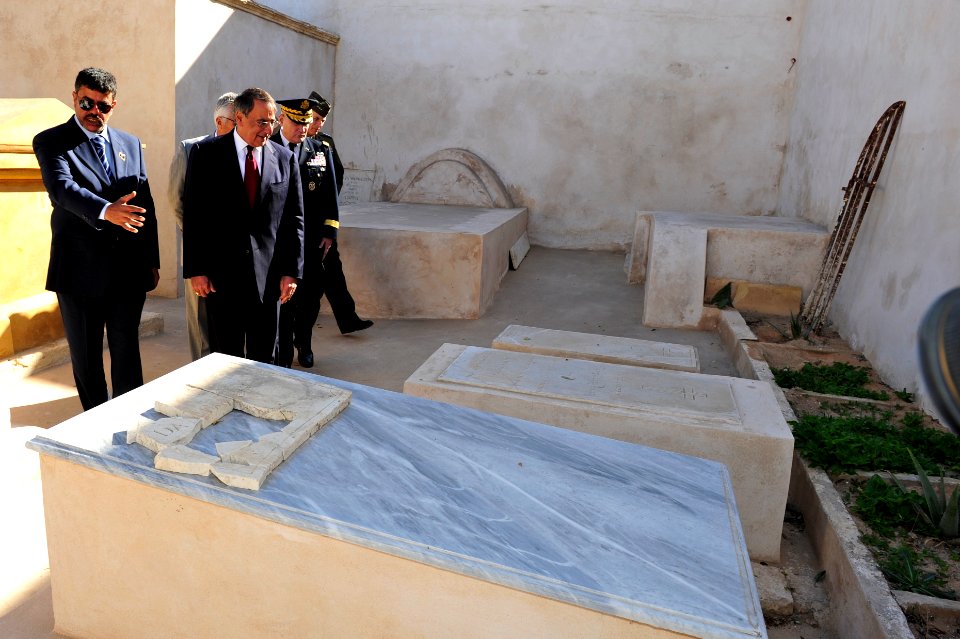 US Navy 111217-D-BW835-004 U.S. Defense Secretary Leon E. Panetta, right, tours a cemetery on the shores of Tripoli, Libya