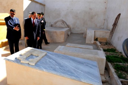 US Navy 111217-D-BW835-004 U.S. Defense Secretary Leon E. Panetta, right, tours a cemetery on the shores of Tripoli, Libya