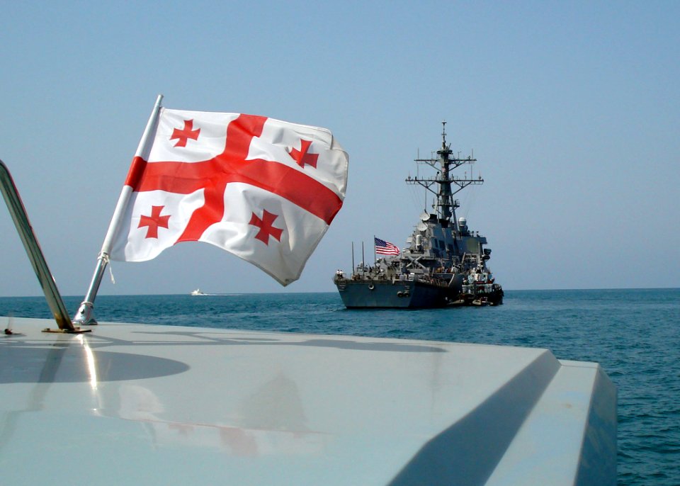 US Navy 080824-6483G-N-001 The guided-missile destroyer USS McFaul (DDG 74) delivers more than 80 tons of needed humanitarian assistance supplies