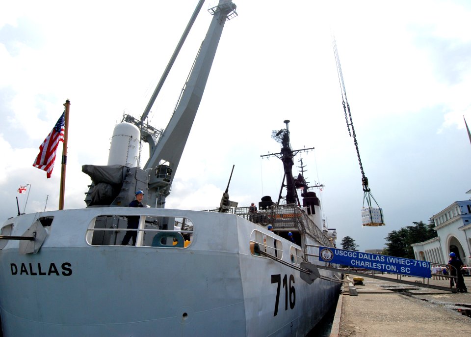 US Navy 080827-N-4044H-044 A pallet of humanitarian assistance supplies is offloaded from the U.S. Coast Guard Cutter Dallas (WHEC 716)