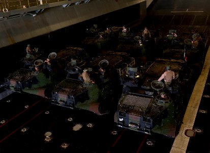 US Navy 120207-N-NL541-336 Amphibious assault vehicles are prepared to disembark from the well deck