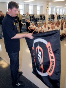 US Navy 080827-N-8848T-416 Dale Earnardt Jr. views the Dale Jr. Division guidon